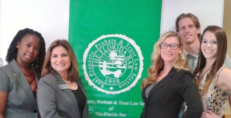 RPPTL members with the Section banner